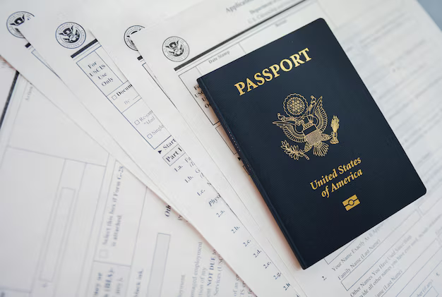 closeup-us-passport-with-immigration-visa-citizenship-travel-paperwork-wooden-tabl_871349-187